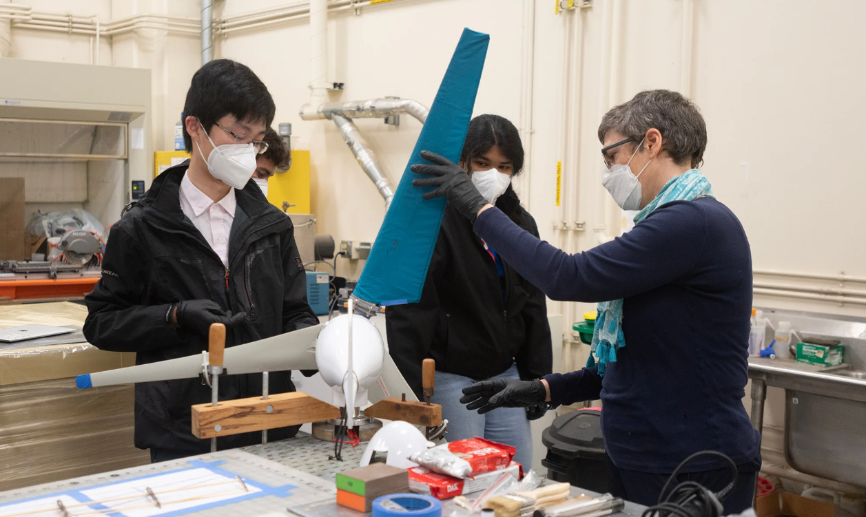 Researchers in a lab show prototype wind turbine blade