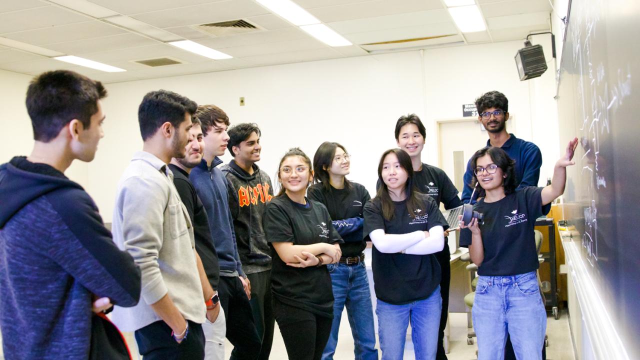 UC Davis Hyperloop OneLoop members near a chalkboard