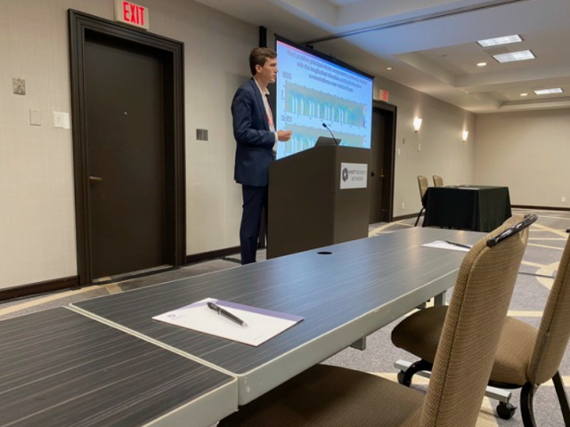 Nicholas Bachus giving a presentation