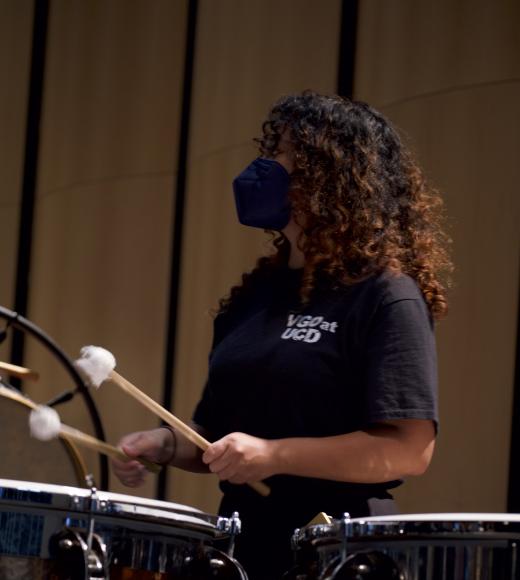 Tichada Tantasirikorn drumming in UC Davis Video Game Orchestra