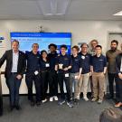 The UC Davis team standing together in front of a screen that says "CITRIS Aviation Prize Winners"